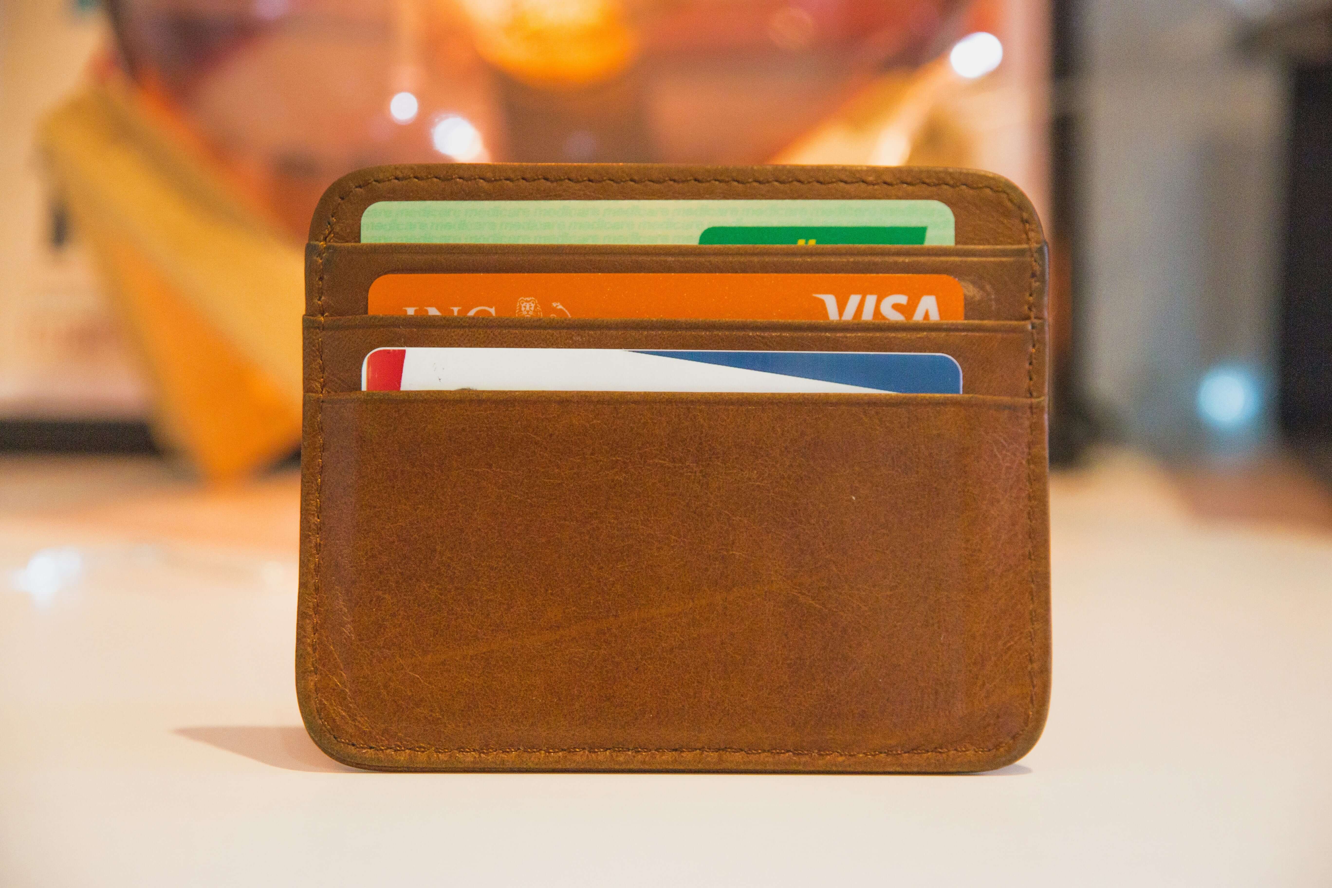 Credit cards in a brown leather wallet